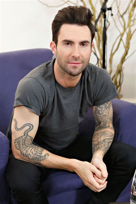 adam levine tattoos.